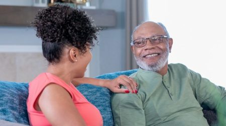 man and woman talking