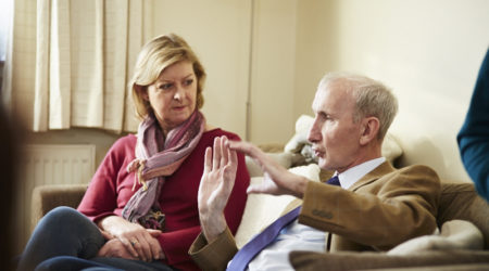 Older couple sat on the sofa