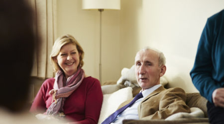 Older couple sat on the sofa