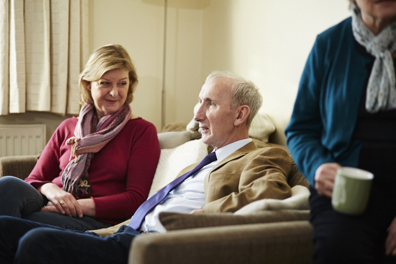 Older couple sat on the sofa