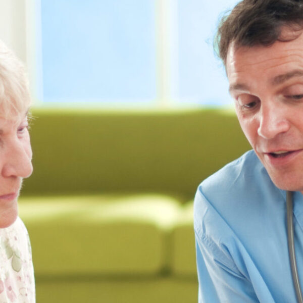 Woman speaking to a doctor at her medical appointment