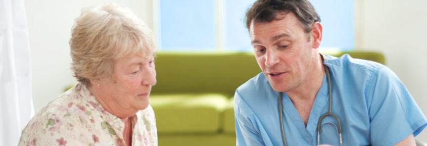Woman speaking to a doctor at her medical appointment