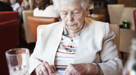 Woman using a pill box