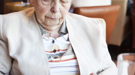 Woman using a pill box