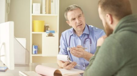 Doctor and patient having a discussion in the doctor's surgery