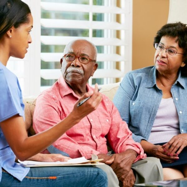 Nurse talking to a couple