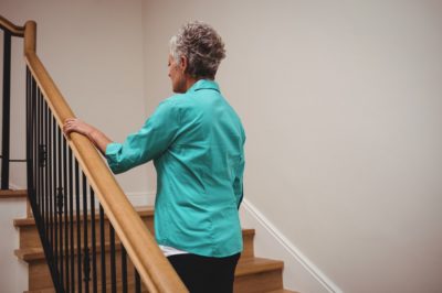 Woman is climbing the stairs
