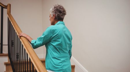 Woman is climbing the stairs