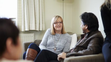 A man and a woman talking