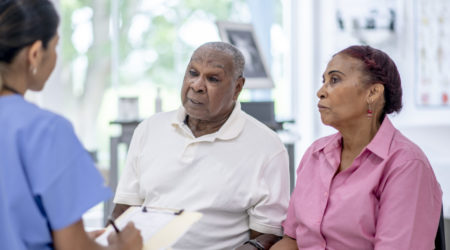 Couple talking to a nurse