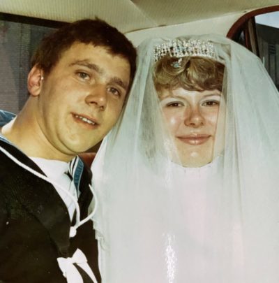Sue and her husband on their wedding day