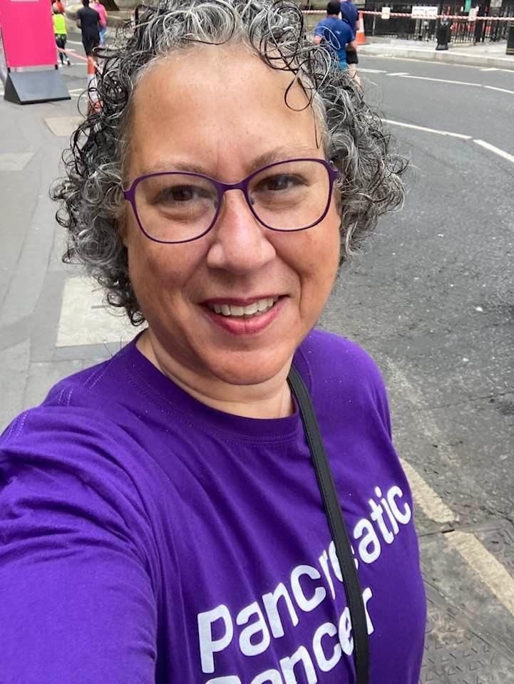 A selfie taken by Sandra, one of our Events Volunteers, wearing her purple PCUK t-shirt