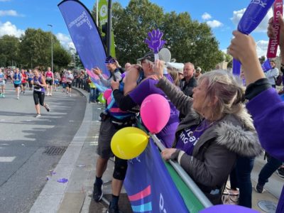 PCUK volunteers cheering on runners at one of our che