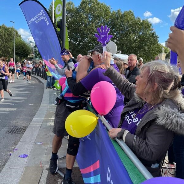 PCUK volunteers cheering on runners at one of our che