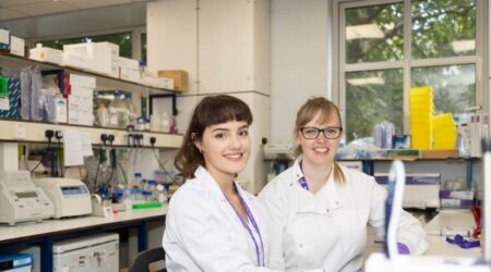 Image of two researchers in a lab