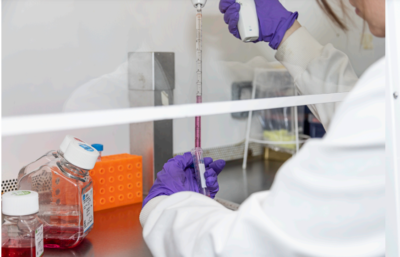 Female researcher carrying out some work in a lab.