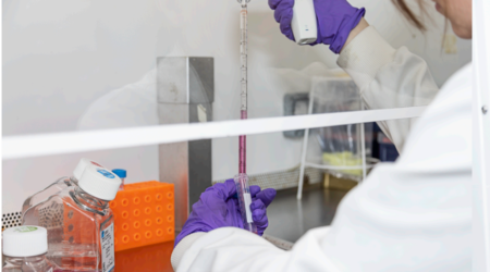 Female researcher carrying out some work in a lab.