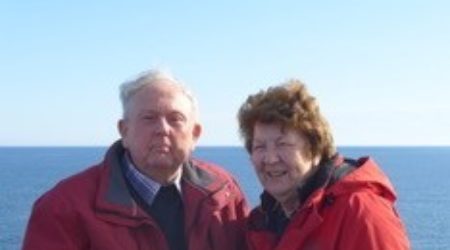 man and woman standing in front of the sea - clive - real life stories PCUK