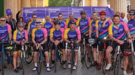 group of people wearing pancreatic cancer tops for ride london