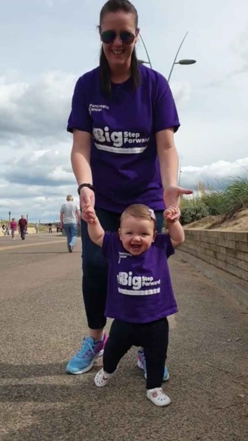 Sharon with her daughter Erin, wearing Big Step Forward t-shirts