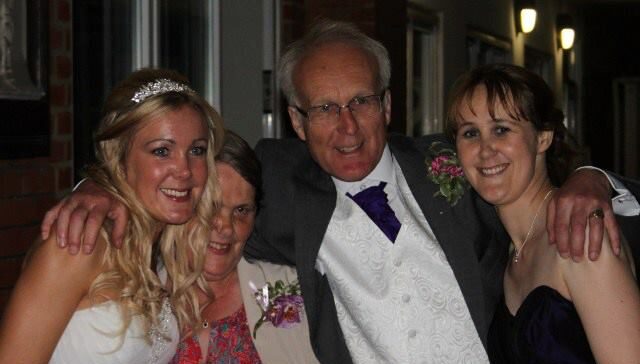 Nicola on her wedding day with mum, dad Clive and her sister.