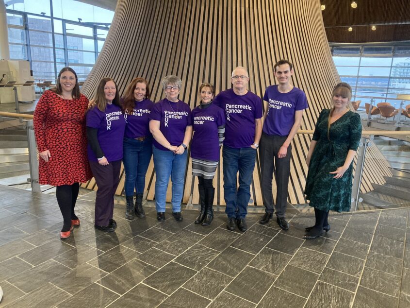 PCUK supporters meeting with Heledd Fychan (L) and Delyth Jewell (R) at our Senedd Debate for Pancreatic Cancer Awareness Month on 6 December 2023