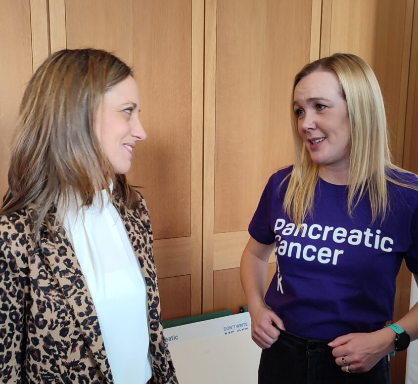 Our supporter Nicola chatting to our MP Helen Whately