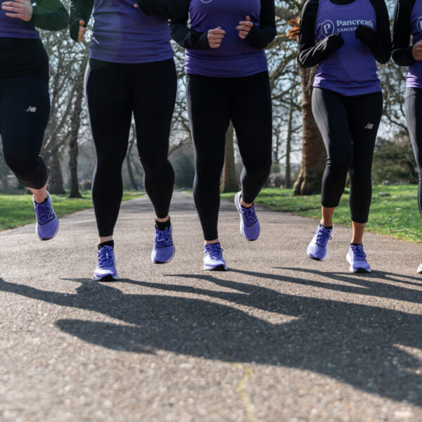 5 pairs of purple trainers running