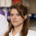Two researchers standing standing next to each other with their arms crossed