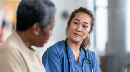 Health professional talking to a patient