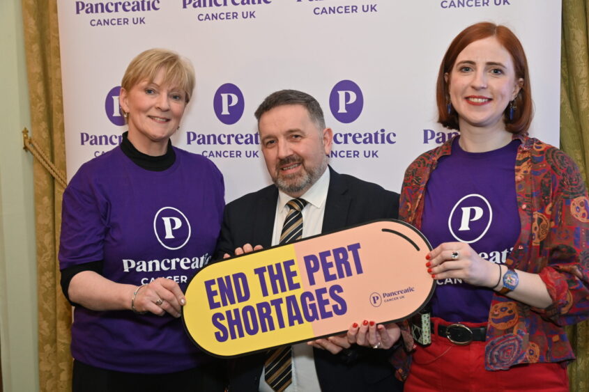 Robin Swann MP stood with us to call for an end to PERT shortages, alongside Claire and her mum Terri