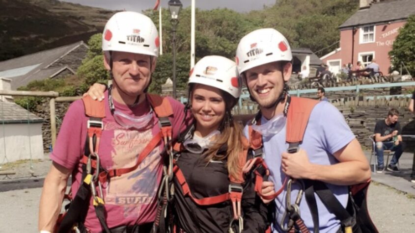 David and Lucy with their dad in climbing gear