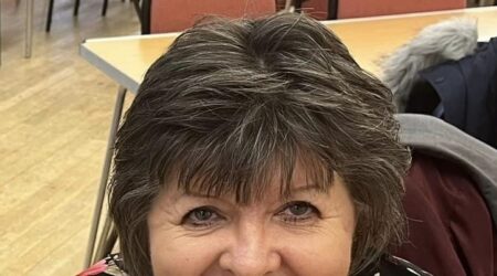 Image of volunteer Gail smiling at the camera