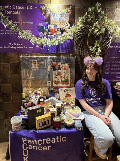 Image of volunteer Kiaragh at a raffle fundraising event