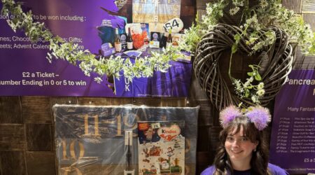 Image of volunteer Kiaragh at a raffle fundraising event