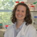 Female research in a lab coat in a research lab