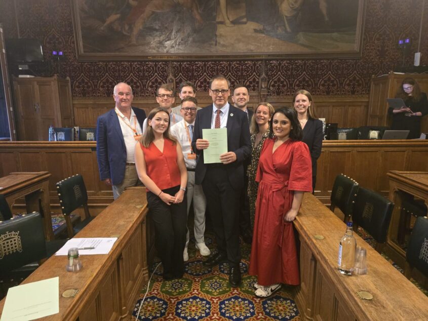 Image of charity representatives with Scott Arthur MP in the House of Commons.