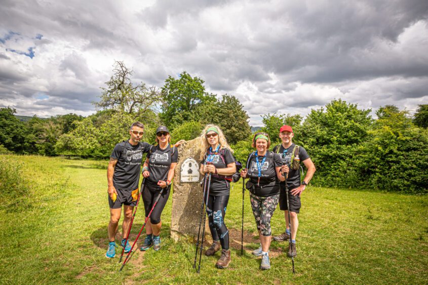 Group of five walkers in the Cotswolds