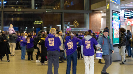 a busy london train station with people wearing more than hope tops on the back, there Celebrating another successful Pancreatic Cancer Awareness Month