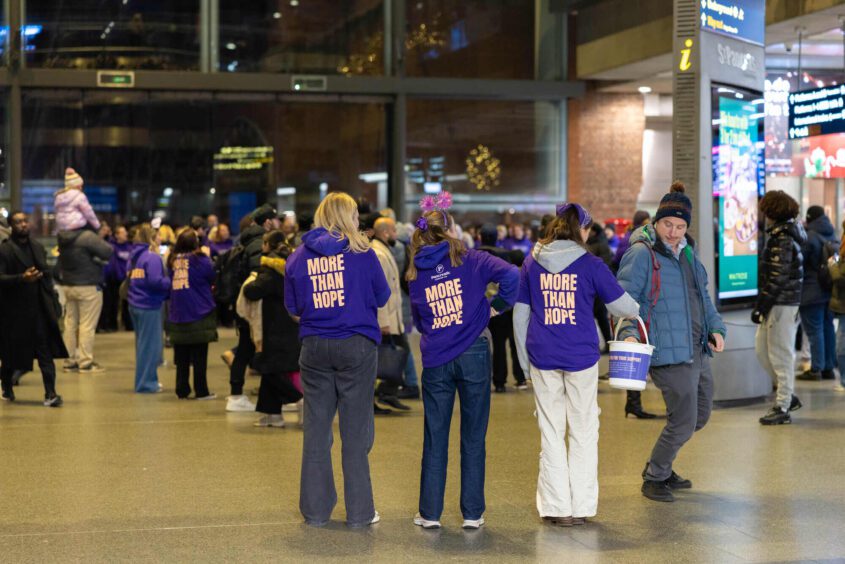 a busy london train station with people wearing more than hope tops on the back, there Celebrating another successful Pancreatic Cancer Awareness Month
