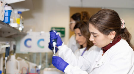 researchers in a lab doing testing