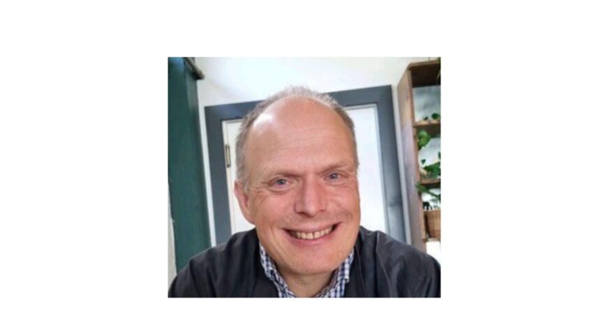 portrait of middle age man smiling to camera