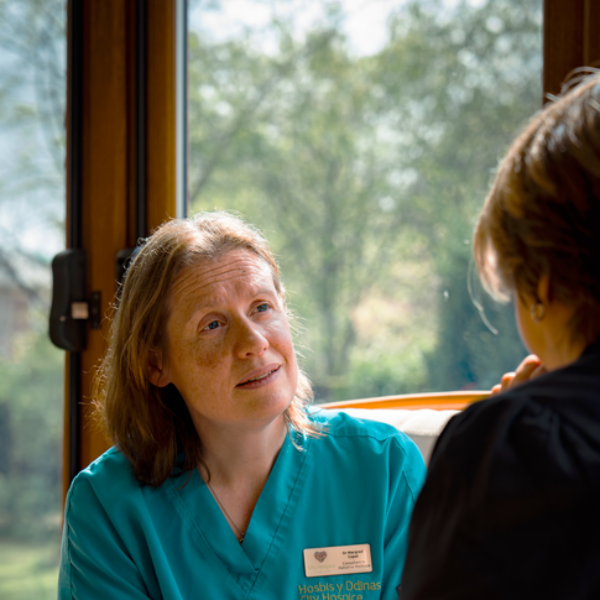 Margred talking to patient