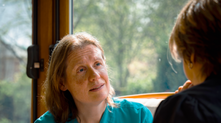 Margred talking to patient