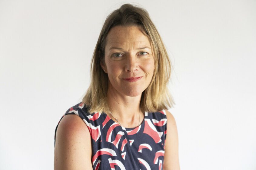 Lisa Woodrow smiling and facing the camera